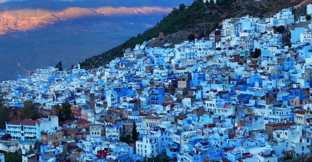 Stunning blue-washed streets of Chefchaouen, known for its artistic vibe and beautiful scenery, a must-visit attraction in Morocco.