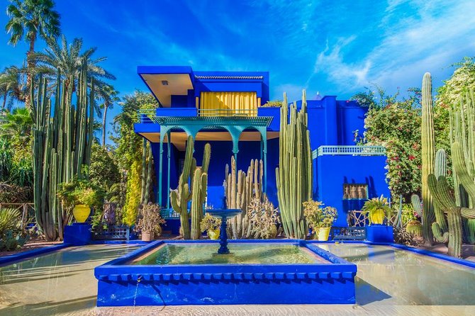 Serene view of Majorelle Garden in Marrakech, showcasing its vibrant blue colors and lush plants, a must-visit attraction in Morocco