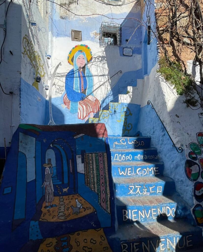 A vibrant blue wall in Chefchaouen, known as the 'Blue City' in romantic Morocco, showcasing intricate details and textures that capture the charm of this enchanting destination.