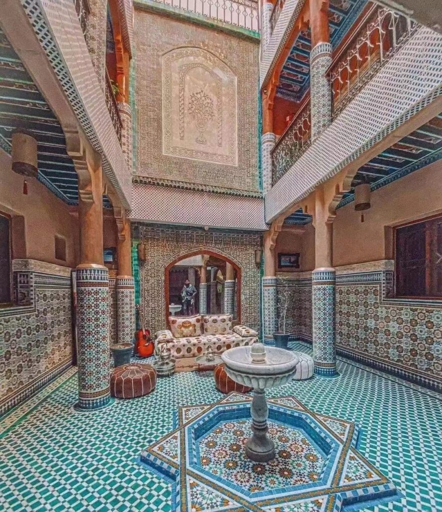 Experience an authentic traditional hammam, an affordable cultural experience in Morocco, where locals relax and socialize in a steamy bathhouse setting.