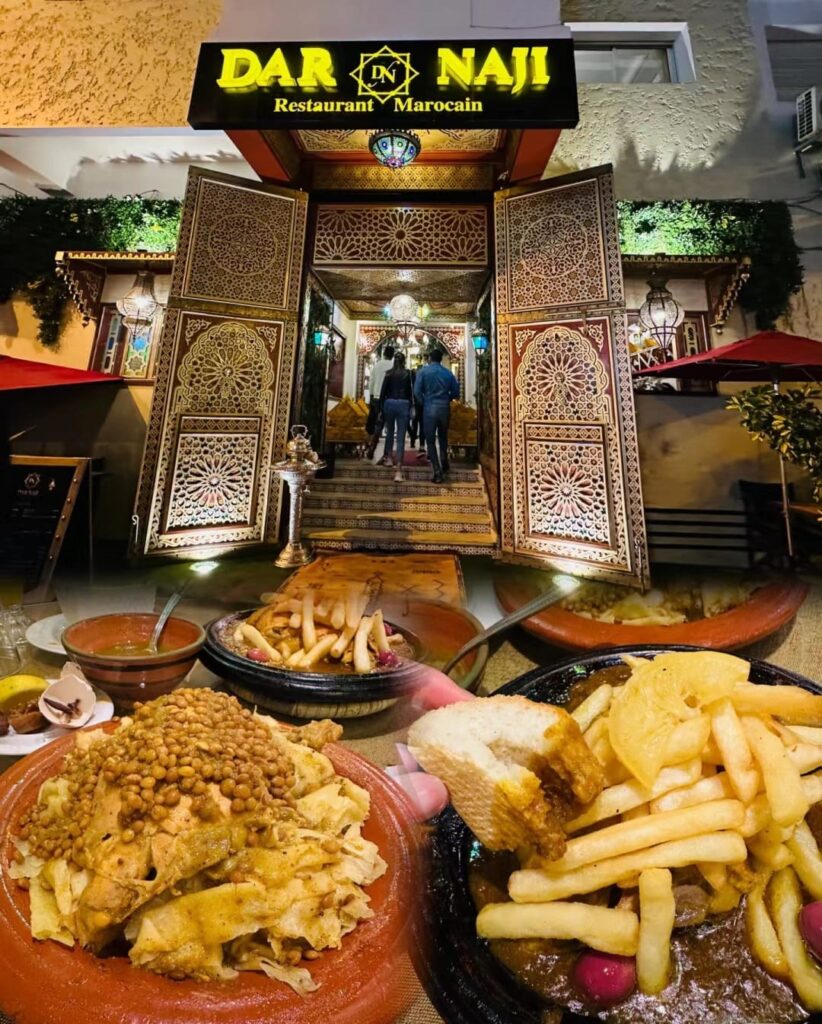 Delicious traditional Moroccan dishes served at Dar Naji, offering affordable cultural experiences in Morocco through authentic flavors and local cuisine.